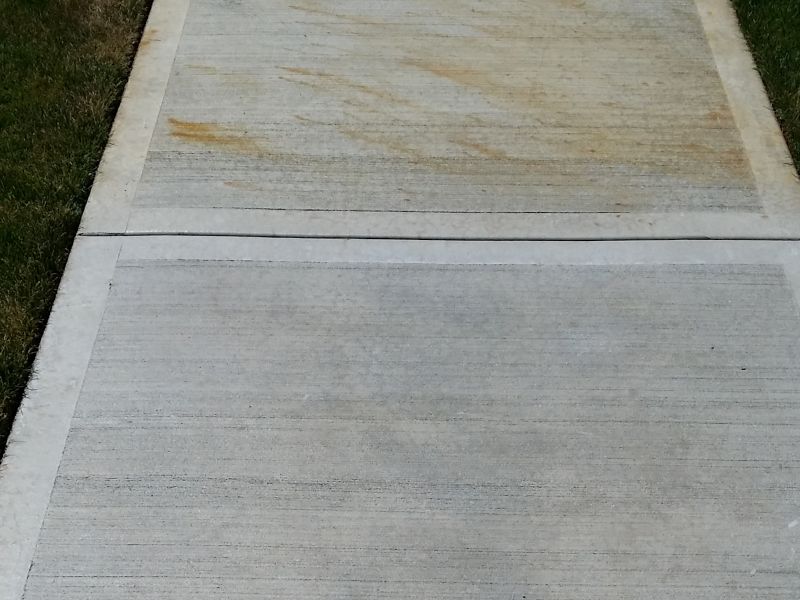 Rust removal service results on concrete surface